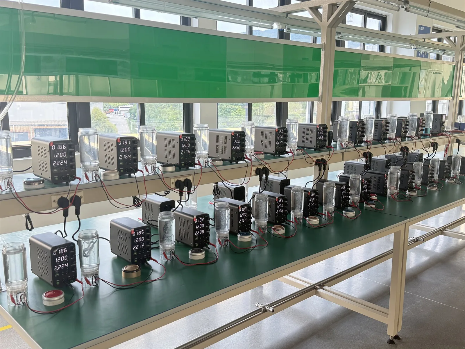 Hydrogen water bottles undergoing organized batch function testing